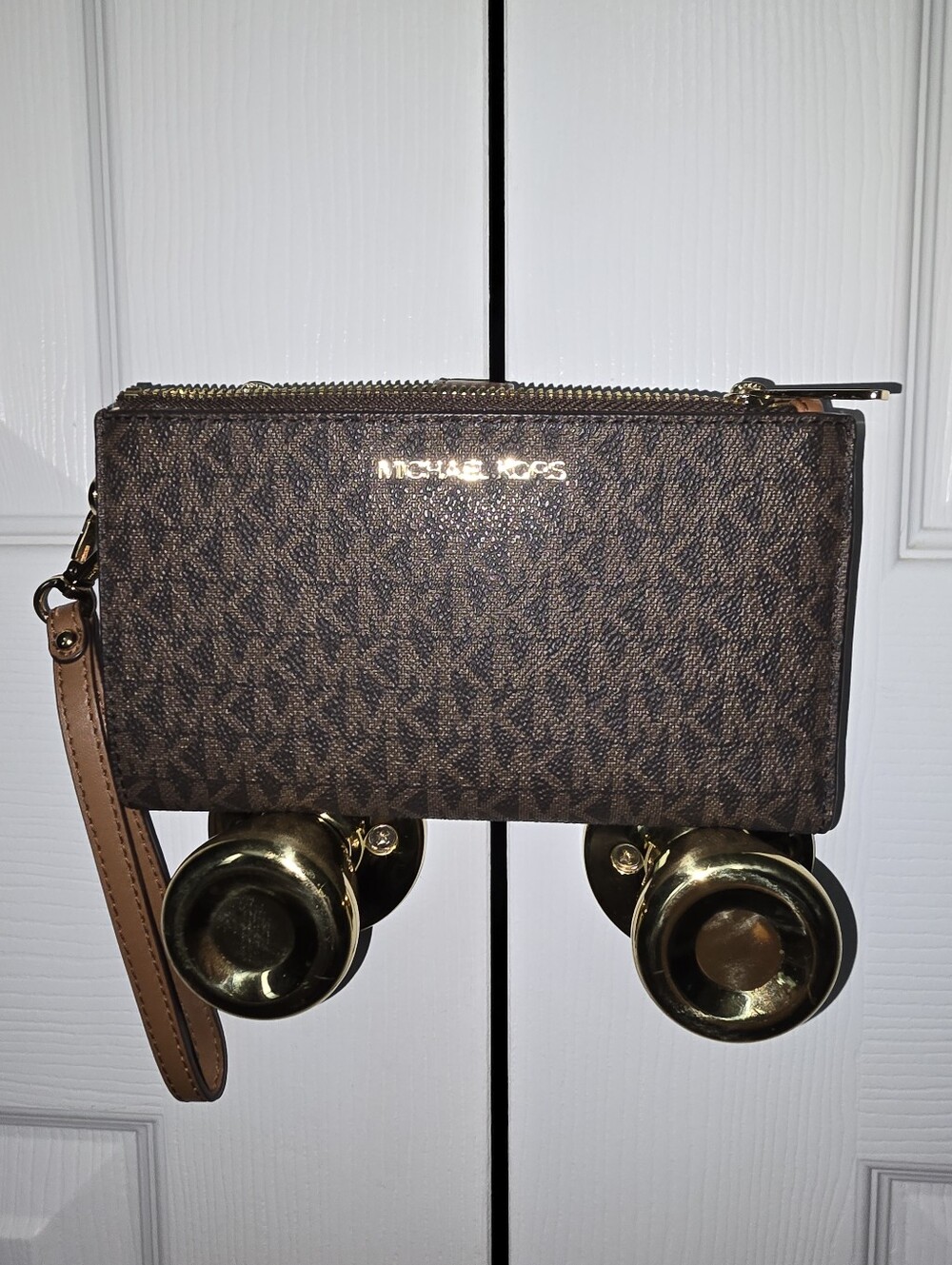 Michael Kors Brown Monogram Zip Wristlet with Tan Strap